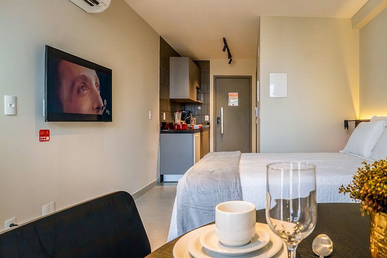 Studio com mini cozinha e vista