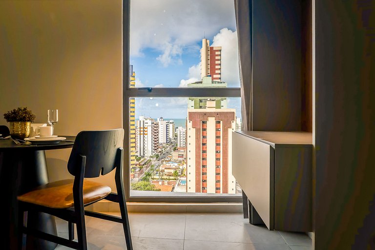 Studio com mini cozinha e vista