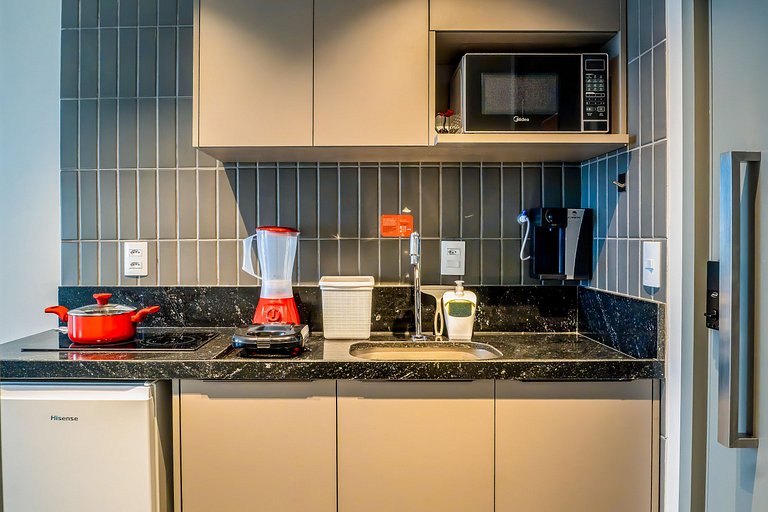 Studio com mini cozinha e vista