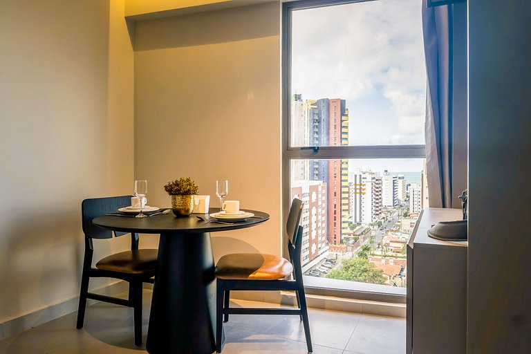 Studio com mini cozinha e vista