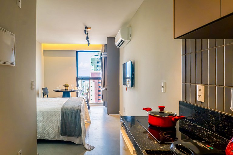 Studio com mini cozinha e vista