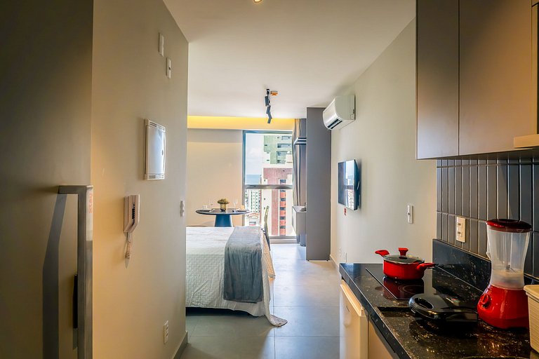 Studio com mini cozinha e vista