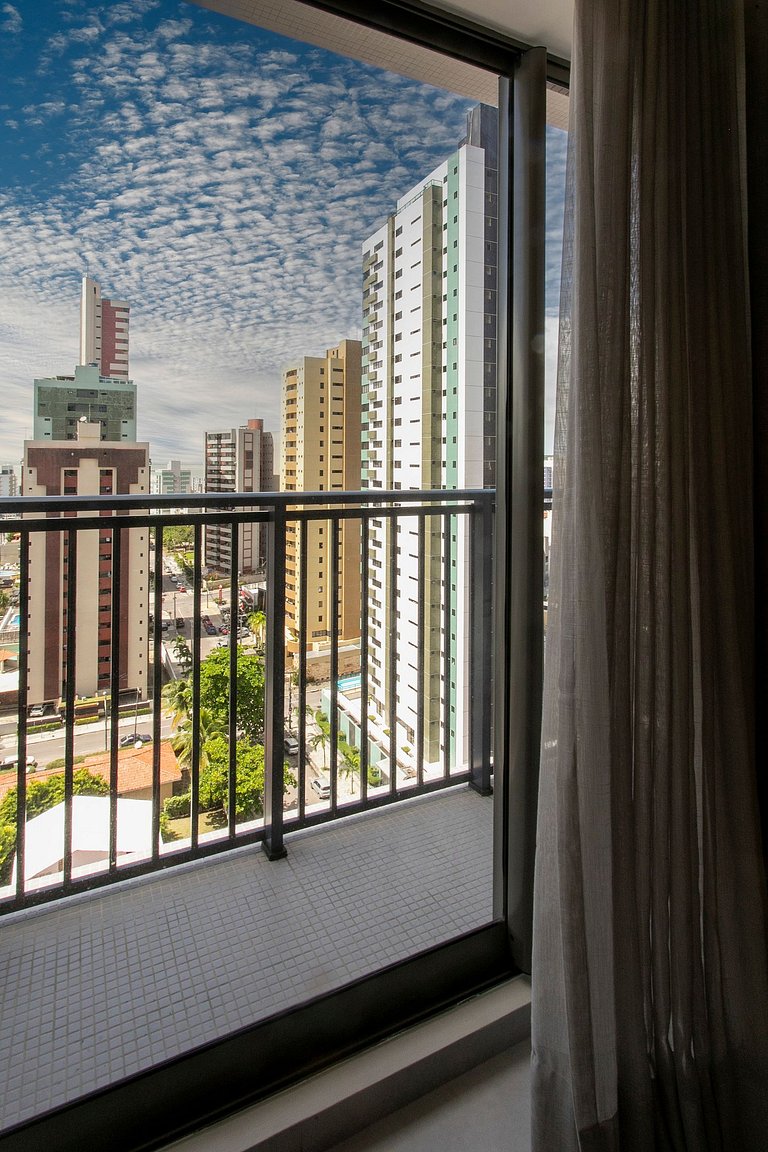 Studio com mini cozinha e vista