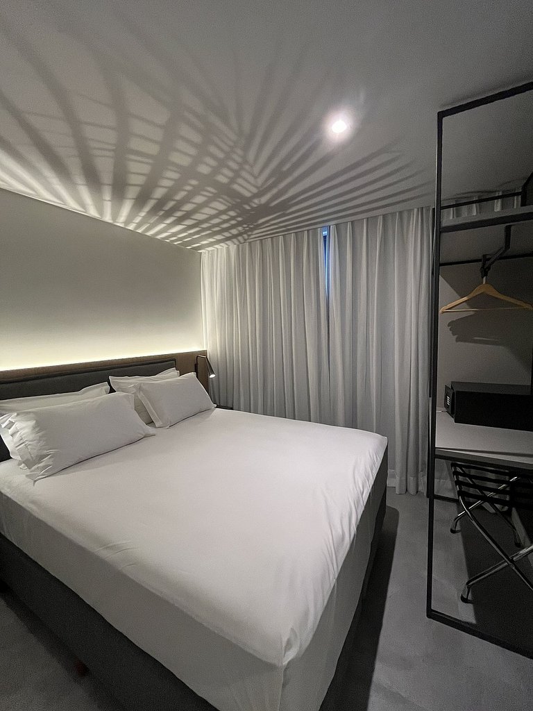 Apto Família 26m² - 3min da praia c/ cozinha
